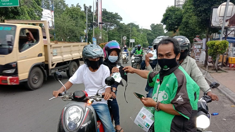title Terdepan dalam Protokol Kesehatan, Mitra Gojek Serang Raya Bagikan Masker dan Edukasi Masyarakat Terdepan dalam Protokol Kesehatan, Mitra Gojek Serang Raya Bagikan Masker dan Edukasi Masyarakat