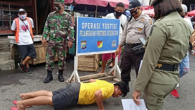 Abaikan Protokol Kesehatan, Ratusan Warga Manado Dapat Sanksi Push-Up