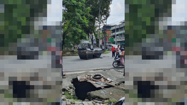 Terobos Lampu Merah, Mobil Kijang Kotak di Medan Terbalik
