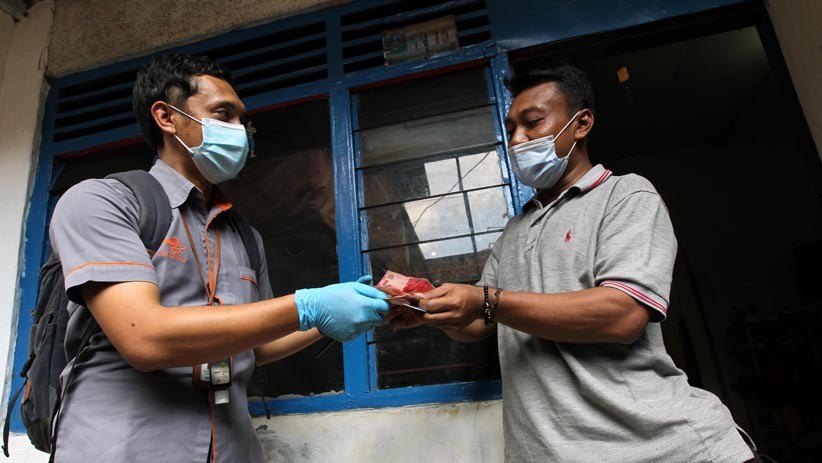 Tak Perlu Keluar, Warga Terima Bantuan Sosial Tunai dari Rumah - Bagian 3