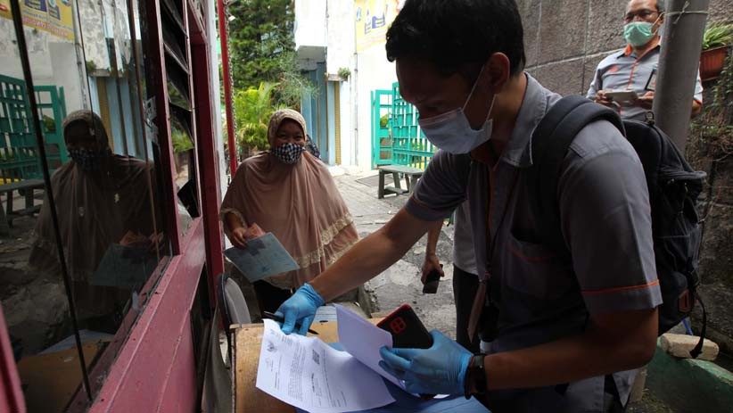 Tak Perlu Keluar, Warga Terima Bantuan Sosial Tunai dari Rumah - Bagian 4