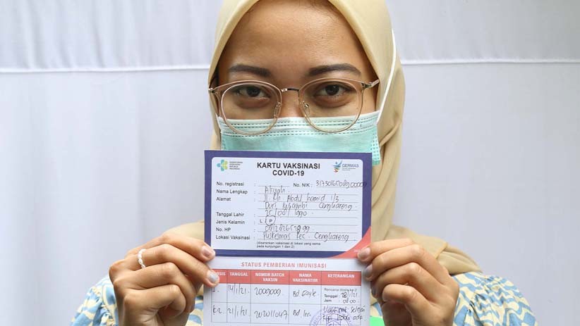 Potret Tenaga Kesehatan Puskesmas Cengkareng Disuntik Vaksin Covid-19 Tahap Dua - Bagian 5