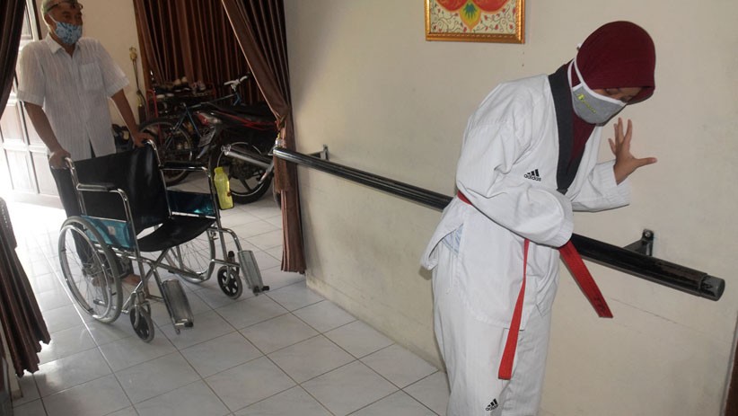 Potret Atlet Taekwondo Tetap Semangat Berlatih Meski Menderita Stroke - Bagian 2
