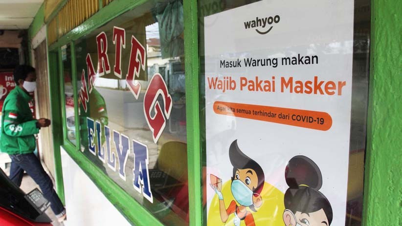 Terapkan Protokol Kesehatan, Warteg di Jaksel Beri Sekat Pembatas Meja Konsumen - Bagian 3