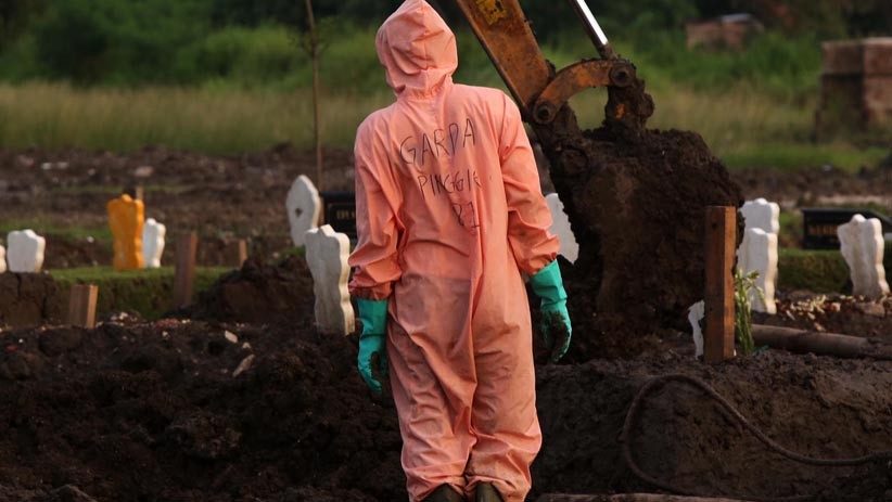 Potret Petugas Makam Setahun Jalankan Tugas Bantu Penanganan Jenazah Covid-19 - Bagian 4