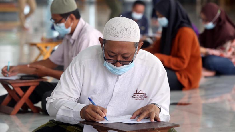 Jelang Ramadan, Ribuan Pengurus Masjid dan Musala Vaksinasi Covid-19 - Bagian 3