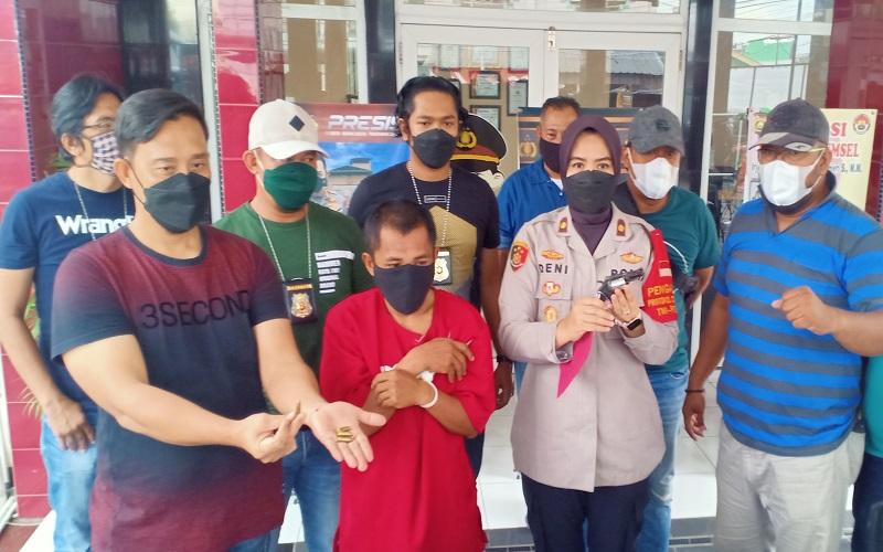 Tukang Ojek di Palembang Ditangkap karena Kantongi Pistol dan 4 Amunisi 