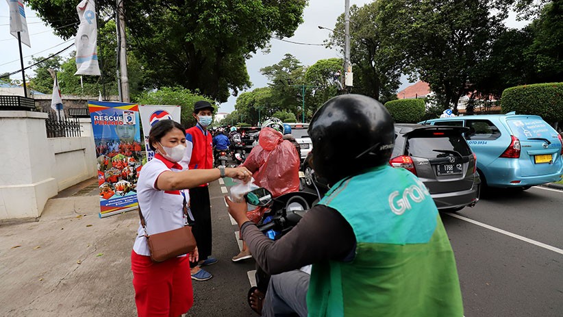 Foto Rescue Perindo Bagikan 400 Bungkus Takjil untuk Pengendara Bermotor - Bagian 2
