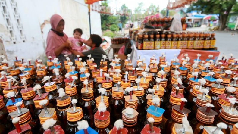 title Tak Ada Festival, Penjualan Lampu Minyak Botol Tradisi Tumbilotohe di Gorontalo Sepi Tak Ada Festival, Penjualan Lampu Minyak Botol Tradisi Tumbilotohe di Gorontalo Sepi