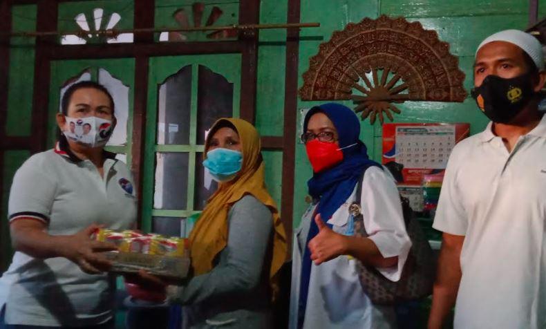 Jelang Lebaran, Perindo Jambi Bagikan Ratusan Minuman Kaleng ke Warga Prasejahtera