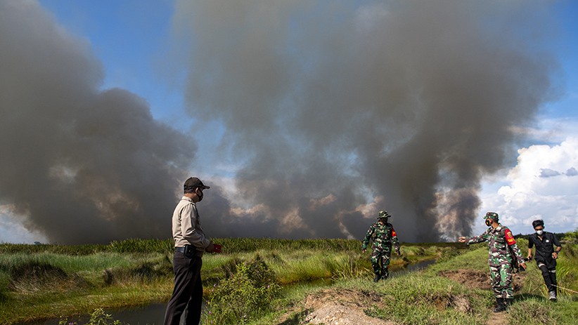 Helikopter BNPB Dikerahkan Padamkan Kebakaran Lahan di Ogan Ilir - Bagian 2