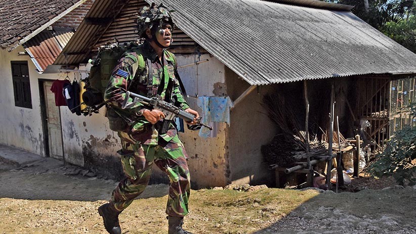 Marinir TNI AL Rebut Daerah Kekuasaan Kelompok Kriminal Bersenjata - Bagian 4