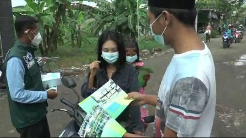 Satgas Covid-19 Imbau Masyarakat Gunakan Dobel Masker di Ruangan Tertutup