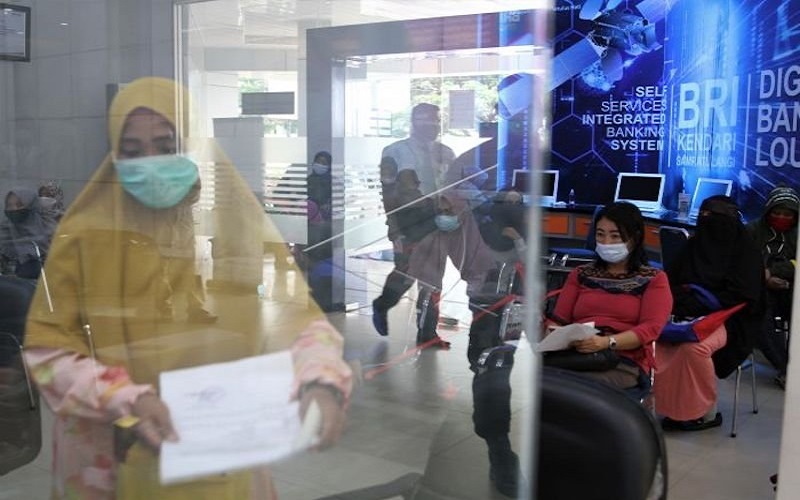  BRI Palembang Pastikan Prokes Dalam Penyaluran Bantuan Pemerintah