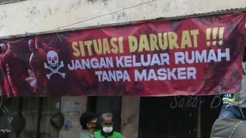 Dukung PPKM Darurat, Linmas di Solo Pasang Spanduk Imbauan Bergambar Tengkorak 