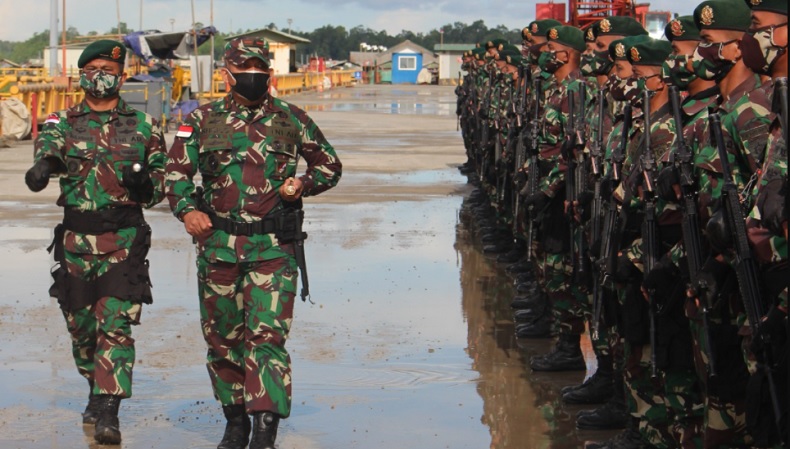 title 9 Bulan Bentengi Papua, Pasukan Macan Kumbang Kostrad Kembali ke Markas 9 Bulan Bentengi Papua, Pasukan Macan Kumbang Kostrad Kembali ke Markas