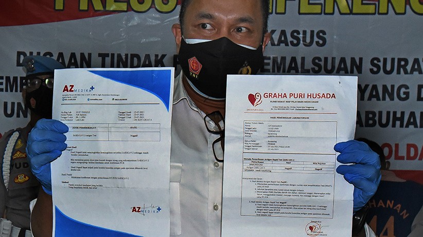 Polda Banten Tangkap Sindikat Pembuat Surat Hasil Tes Covid-19 Palsu - Bagian 1