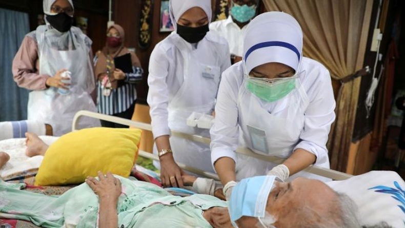 Tak Kunjung Turun, Kasus Covid Malaysia Tembus 20.596 dalam Sehari