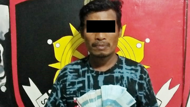 Tukang Parkir di Kota Bitung Gondol Uang Rp8,5 Juta dari dalam Mobil 