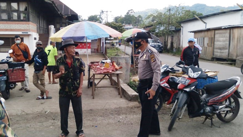 Ingatkan Pentingnya Prokes, Personel Polisi Turun ke 6 Desa di Minahasa 