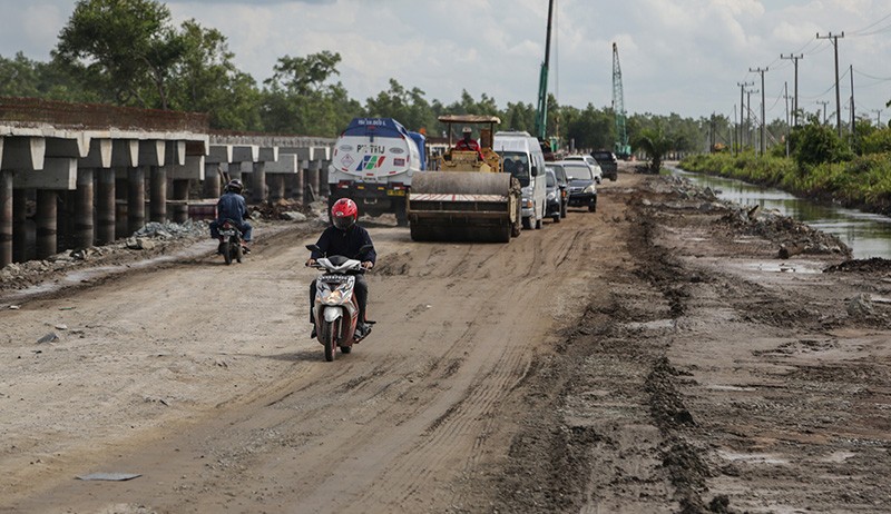 Jalan Trans Kalimantan Rusak akibat Banjir Selama Tiga Pekan - Bagian 1