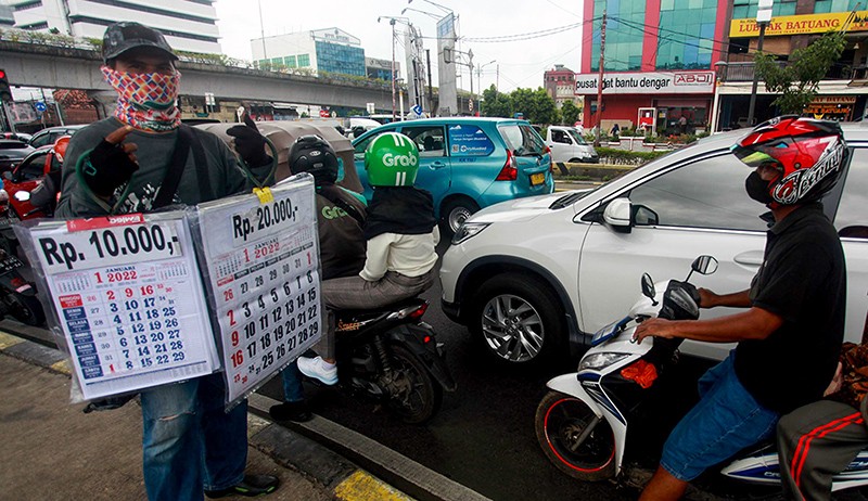 Pedagang Musiman Mencari Rezeki dengan Menjual Kalender Tahun 2022 - Bagian 3