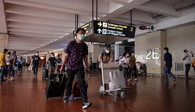 Suasana Puncak Arus Balik Libur Tahun Baru di Bandara Soekarno Hatta - Bagian 3