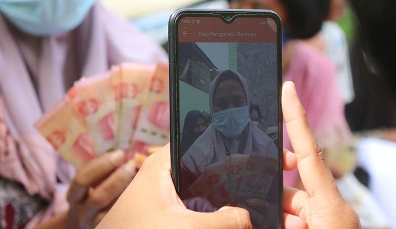Ratusan Warga Pulau Panggang Kepulauan Seribu Terima Bansos Rp600.000 - Bagian 3