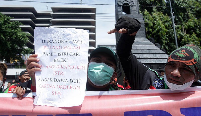 Unjuk Rasa Ratusan Driver Ojek Online Tuntut Kesejahteraan hingga Payung Hukum - Bagian 4