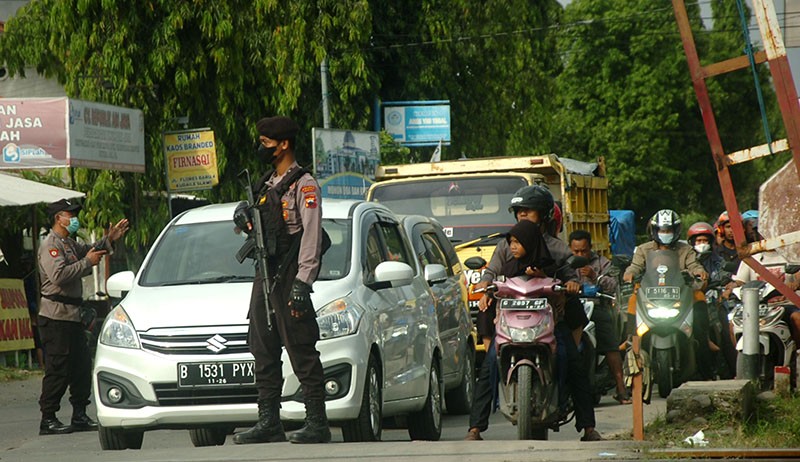 Urai Kemacetan, Polres Tegal Berlakukan Sistem Buka Tutup - Bagian 1