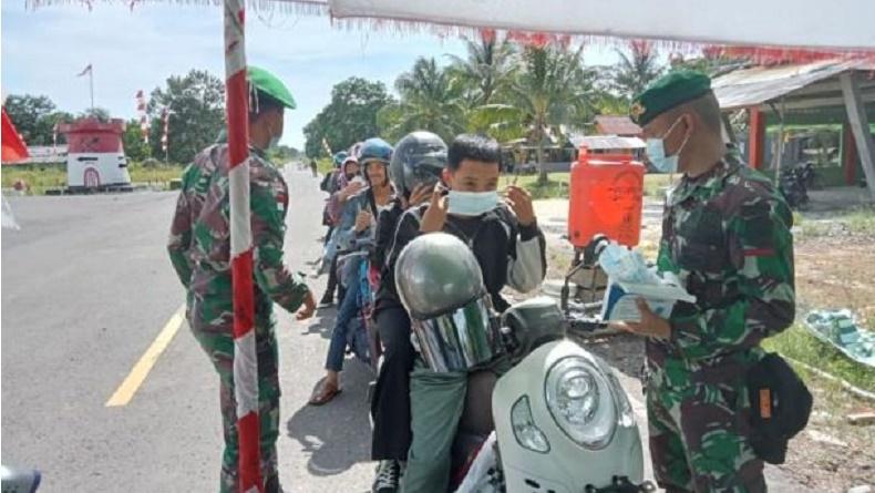 Satgas TNI di Perbatasan Bantu Pengamanan Tempat Wisata saat Libur Lebaran
