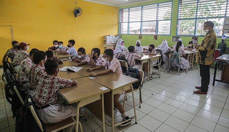 Potret Siswa Semangat Ikuti PTM 100 Persen usai Libur Lebaran - Bagian 4
