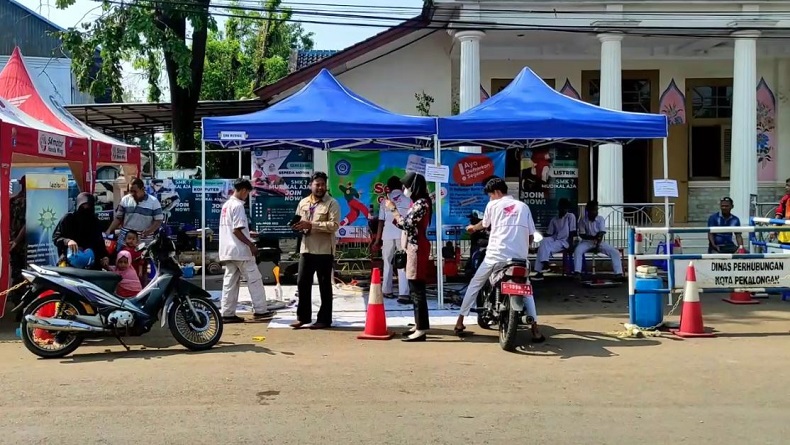 Bantu Warga Terdampak Banjir Rob, Pelajar SMK di Pekalongan Gelar Servis Motor Gratis