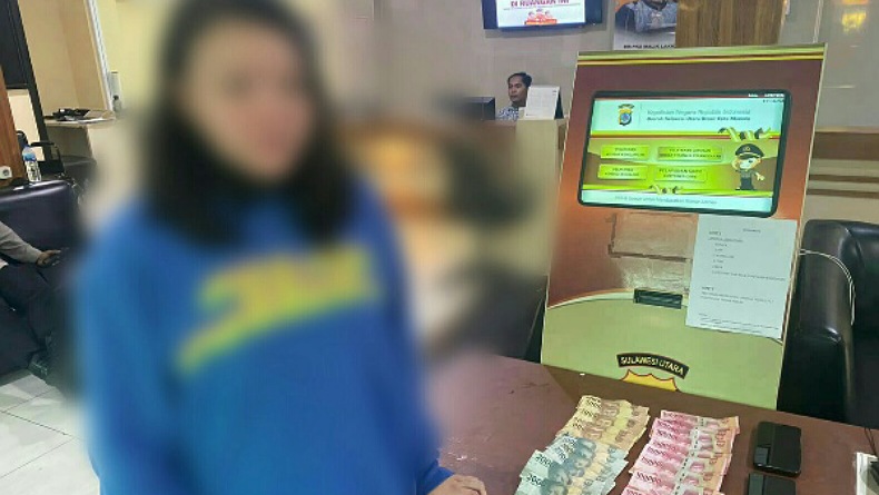 Tertangkap Tangan sedang Rekap Togel Online, Ibu Cantik Digiring ke Polresta Manado