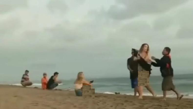  Waduh, Pria Ini Nekat Rekam Bokong Bule Berbikini di Pantai 