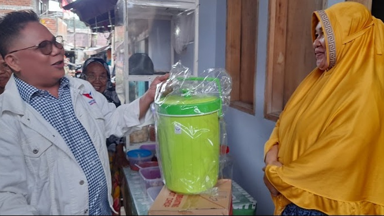 Partai Perindo Kembali Turun Bantu Warga Korban Banjir Manado