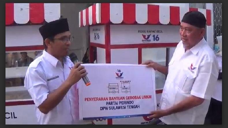 title Kerja Nyata Partai Perindo untuk Rakyat Kecil, Bagikan Gerobak ke Pelaku UMKM di Donggala Kerja Nyata Partai Perindo untuk Rakyat Kecil, Bagikan Gerobak ke Pelaku UMKM di Donggala