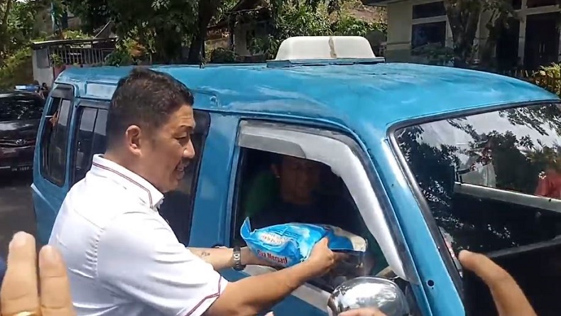 Baksos Partai Perindo di Manado, Bagikan Sembako ke Sopir Angkot dan Tukang Ojek