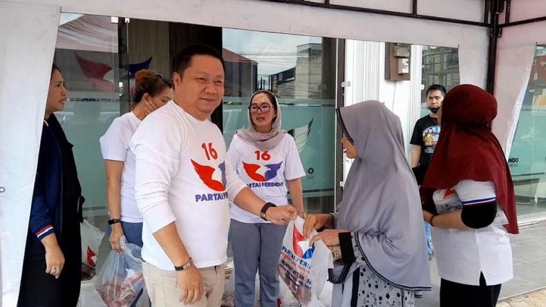 DPW Partai Perindo Jambi Berkurban Sapi, Bagikan Ratusan Paket Daging Kurban ke Warga