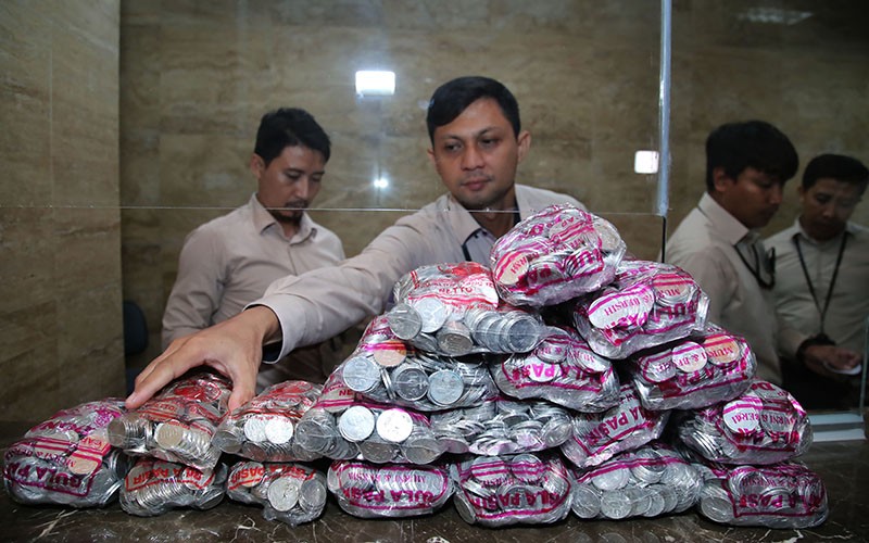 Pedagang di Ternate Kumpulkan Koin Rp500-Rp1.000 dalam Setahun Lebih, Ini Hasilnya - Bagian 2