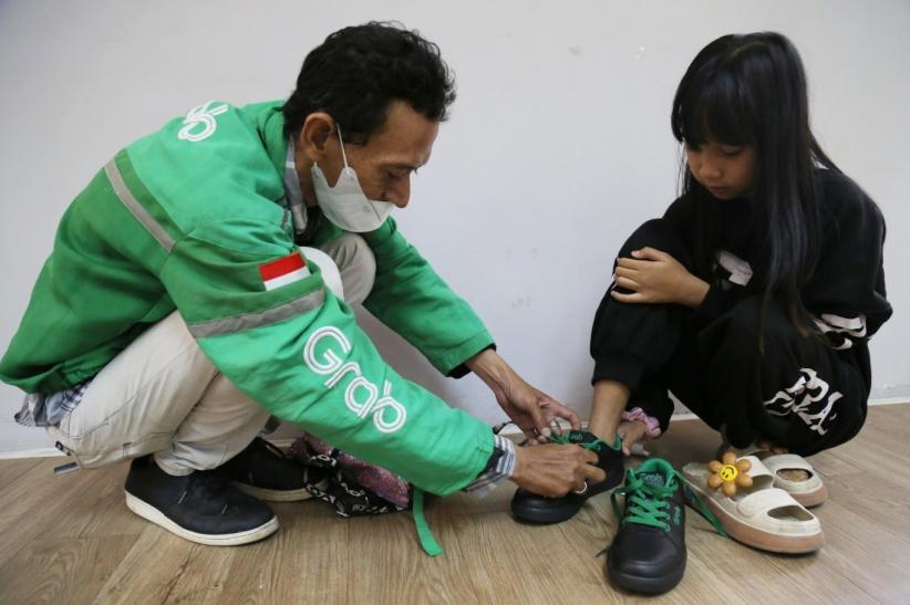 Ribuan Anak Mitra Pengemudi Rayakan Hari Anak Nasional dengan Sepatu Berdesain Khusus Gratis dari Grab - Bagian 1