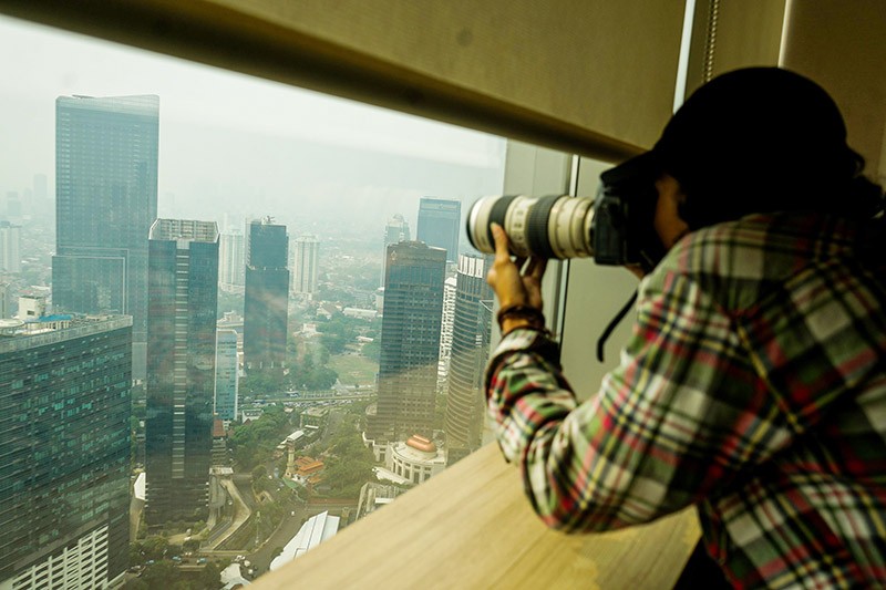 Potret Jakarta Masih Diselimuti Polusi Udara - Bagian 4