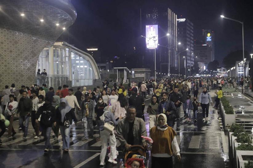 Kemeriahan Malam Tahun  Baru di Bundaran HI, Ada Atraksi Ratusan Drone - Bagian 4