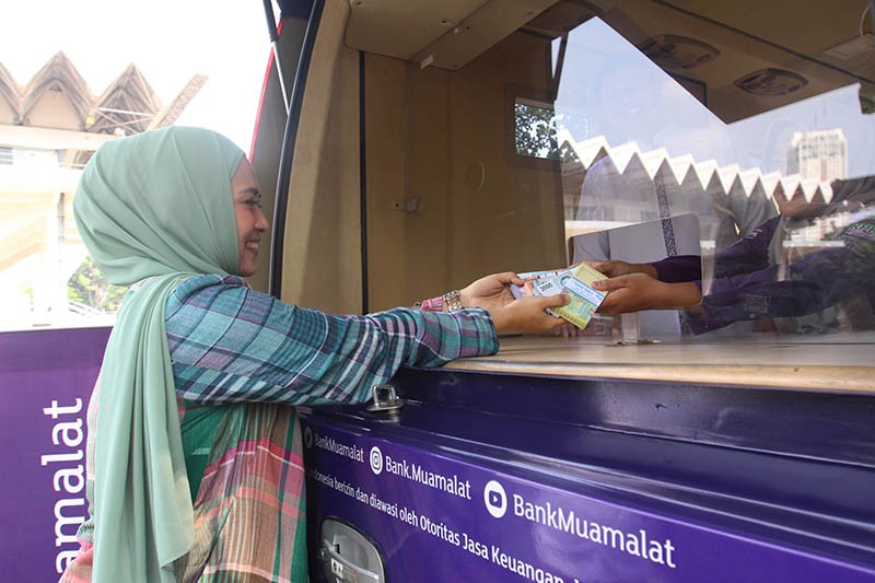 Layani Kebutuhan Idulfitri Tahun Ini, Bank Muamalat Siapkan Uang Tunai Rp736 M - Bagian 2