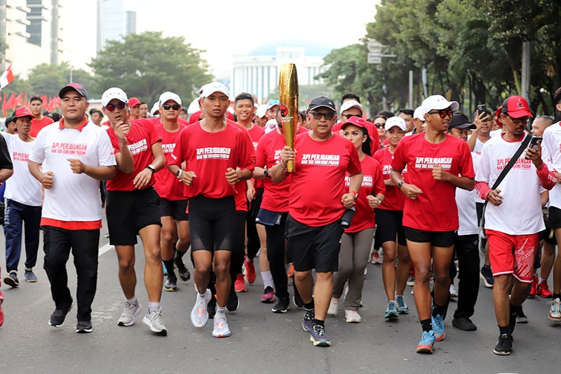 Simpatisan PDI Perjuangan Bawa Obor Api Abadi dari Mrapen Jateng ke Jakarta - Bagian 2