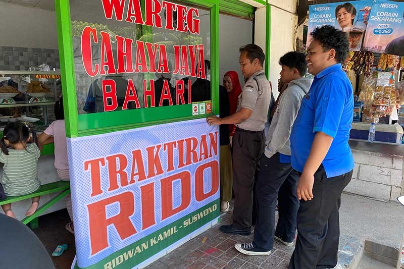 Relawan Ridwan Kamil-Suswono Kembali Traktir Makan Warga Jakarta Sambut Pemerintahan Baru - Bagian 2
