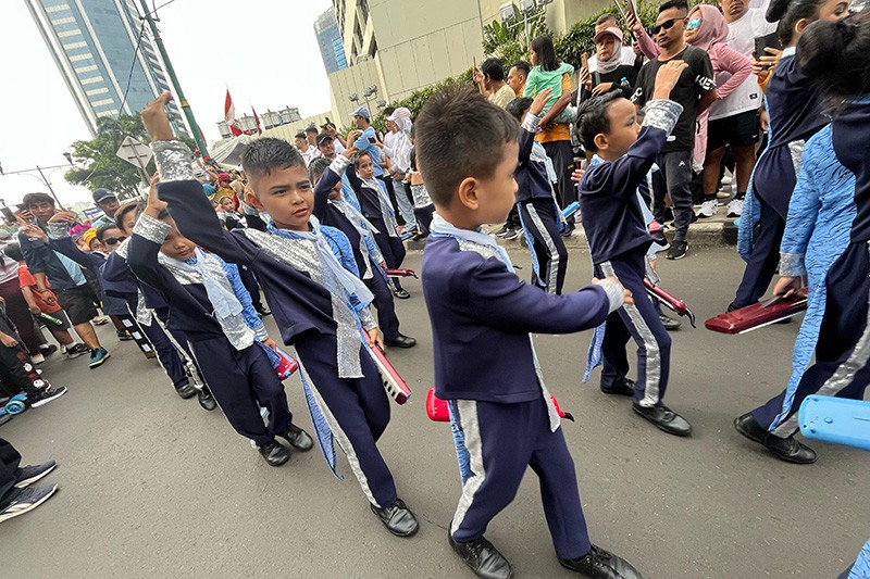 Anak-Anak SD Parade di CFD Jakarta Dukung Perdamaian Dunia - Bagian 3