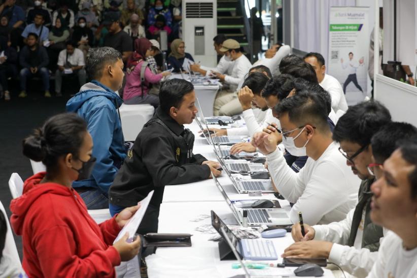 Antusiasme Warga Tukar Uang Baru yang Digelar Bank Indonesia - Bagian 6