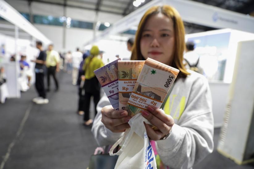 Antusiasme Warga Tukar Uang Baru yang Digelar Bank Indonesia - Bagian 1