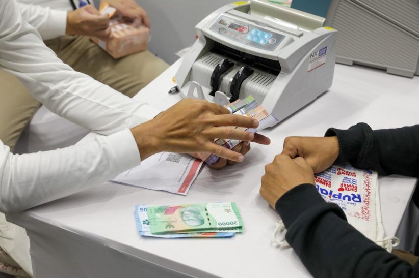 Antusiasme Warga Tukar Uang Baru yang Digelar Bank Indonesia - Bagian 3